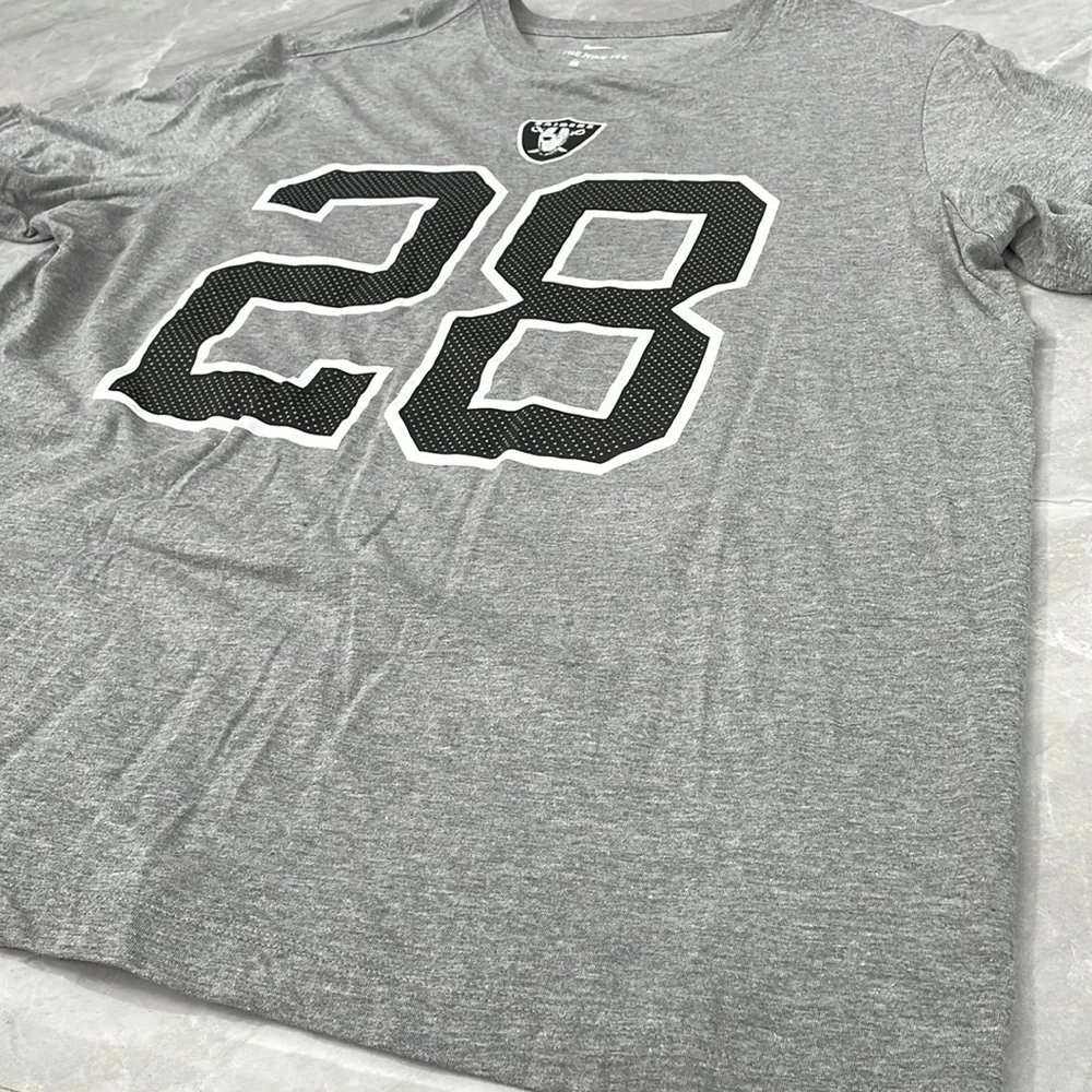 Men’s The Nike Tee Raiders Josh Jacobs #28 Short Sleeve Shirt XL